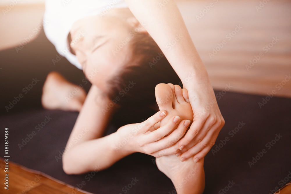 Yoga Concept. Close up woman meditates while practicing yoga in training hall or home. Yoga Concept. Close up woman meditates while practicing yoga in training hall or home.