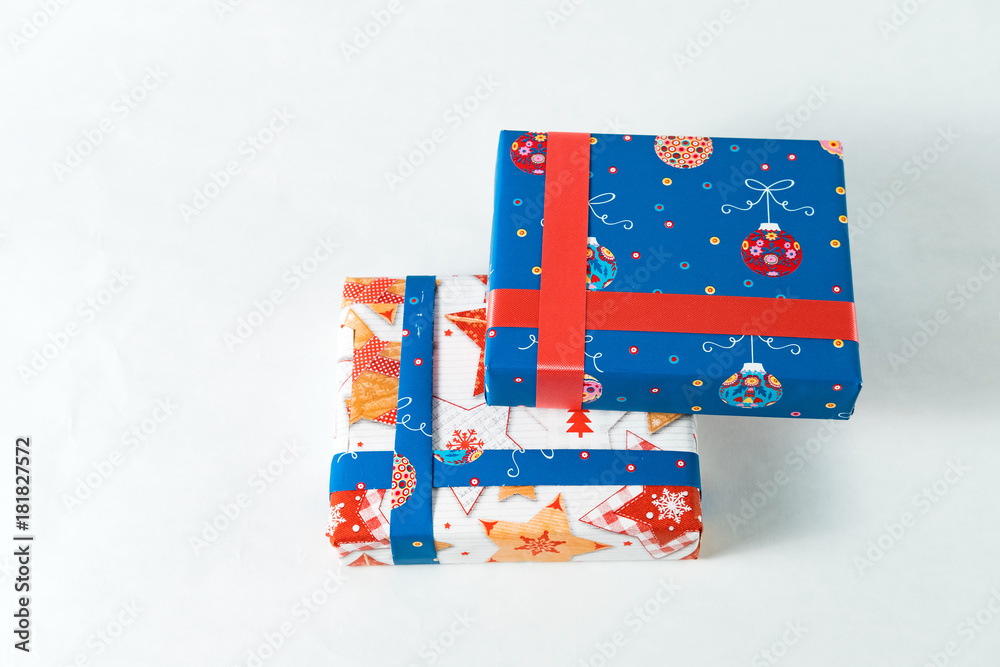 Obraz premium gift white and blue Christmas, New year colored packaged beautifully on a white background