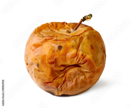 Old rotten apple on white isolated background