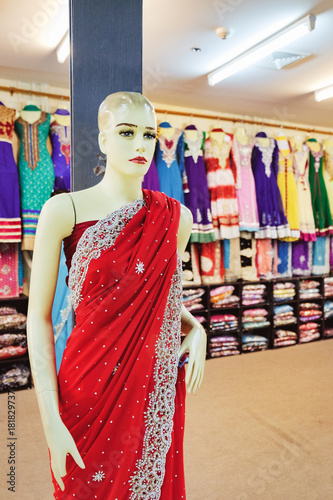 Traditional Indian women's clothing for sale at the street market in Chinatown district, Bangkok, Thailand. Mannequin in colorful beautiful clothes