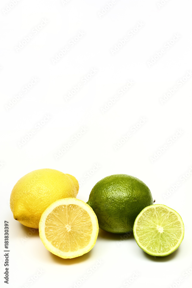 Studio shot image of fresh organic juicy lemons and limes isolated on a white background Studio shot image of fresh organic juicy lemons and limes isolated on a white background