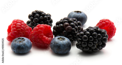 Berries isolated on white background blackberry blueberry and raspberry mix.
