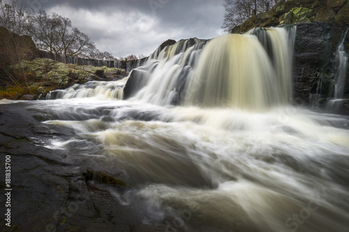 Image of Southford Falls at Southford falls State Park in Southbury, Connecticut, USA., taken after tow days of rain.