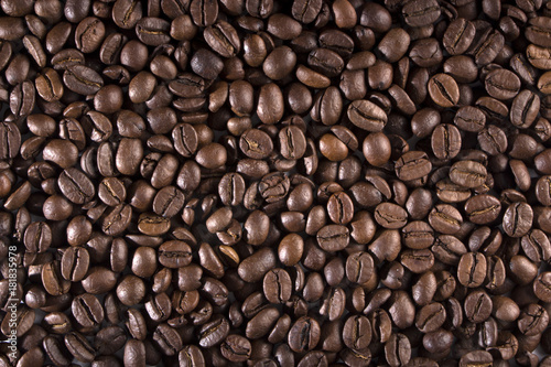 texture of coffee, with beautiful patches of light on the surface of grains