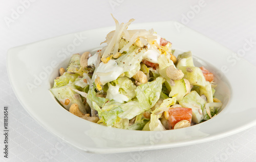 Tasty Iceberg Lettuce with cashew nuts photo