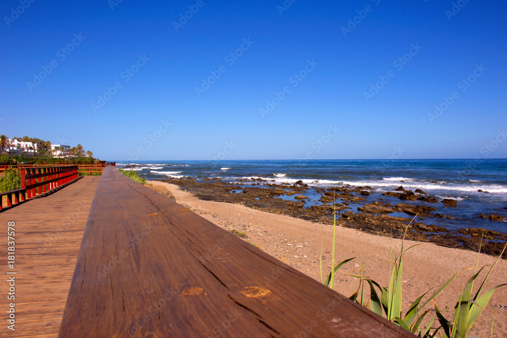 Beach. Wooden road in the beach. Costa del Sol, Andalusia, Spain.