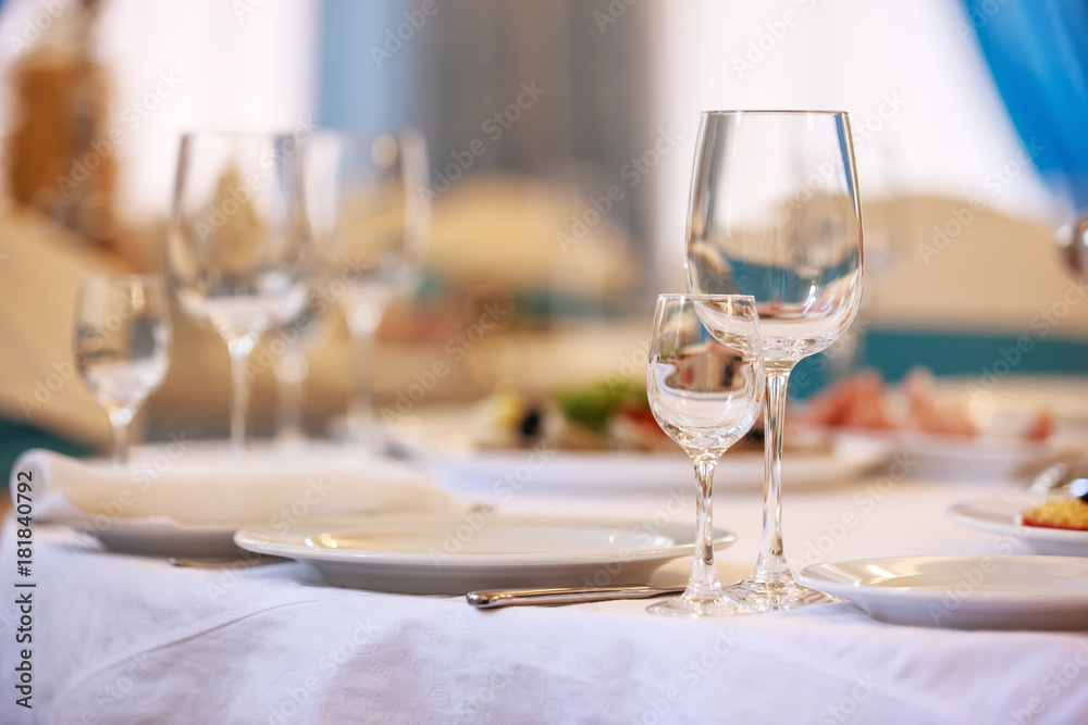 Served table in a restaurant a blurred background Served table in a restaurant a blurred background