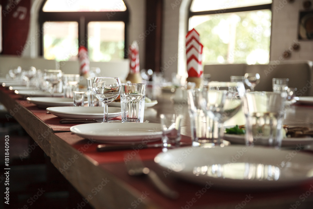Served table in a restaurant a blurred background Served table in a restaurant a blurred background