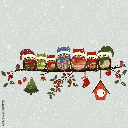 Greeting card with Christmas owls on branch