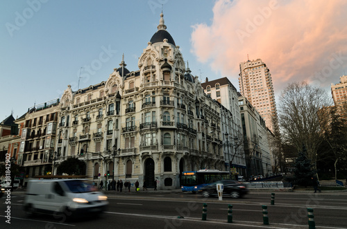 Vehicles in movement in front of an historic building in Plaza España square in Madrid (Spain)