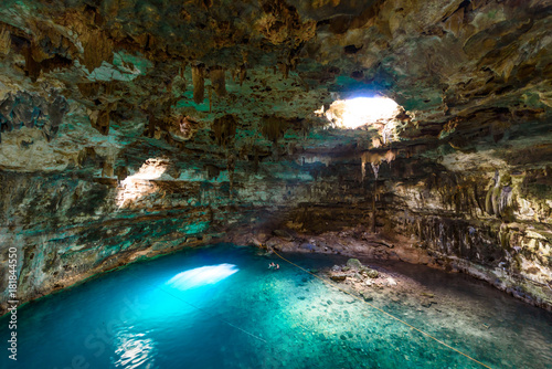 Cenote Samula Dzitnup near Valladolid, Yucatan, Mexico - swimming in crystal blue water photo