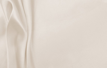 Smooth elegant golden silk or satin luxury cloth texture as wedding background. Luxurious background design. In Sepia toned. Retro style