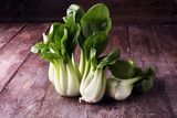 Fresh Bok choy vegetable on the wooden background.