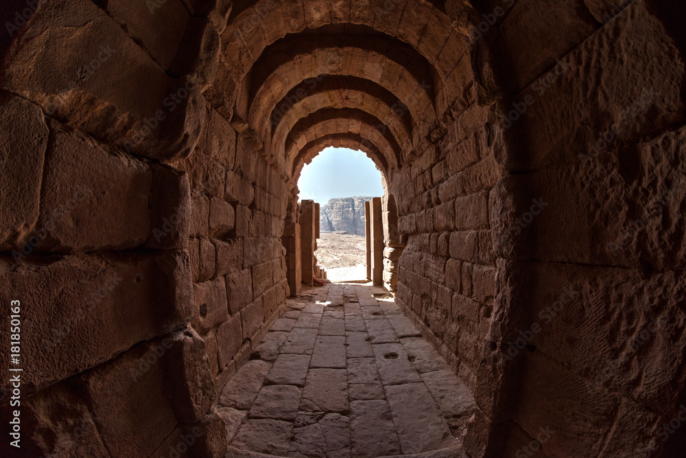 Inside a building excavated into a stone in the ancient city of Petra, Jordan