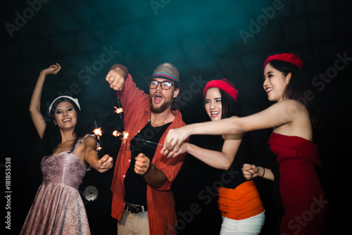 Blurred People Dancing in Party - Group of Friends Enjoy Playing Firework and Dancing in Nightclub