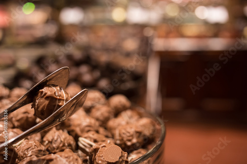 Belgium tasty truffle delicious chocolate in a row  candy shop view. Food travel tourism.