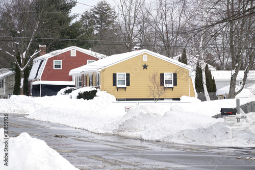 Colorful houses after snow storm in winter