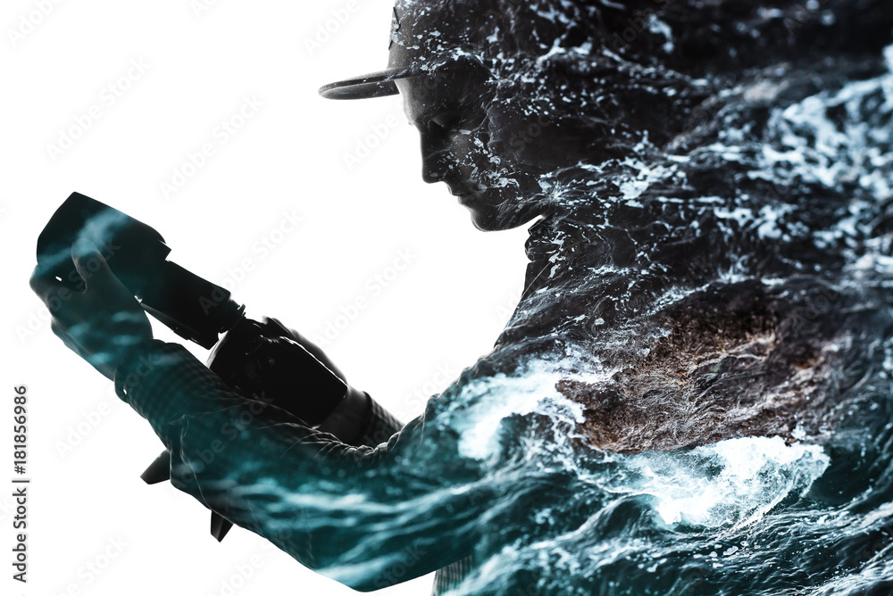 Portrait of handsome man in cap with camera on wavy sea background. Double exposure. Future concept