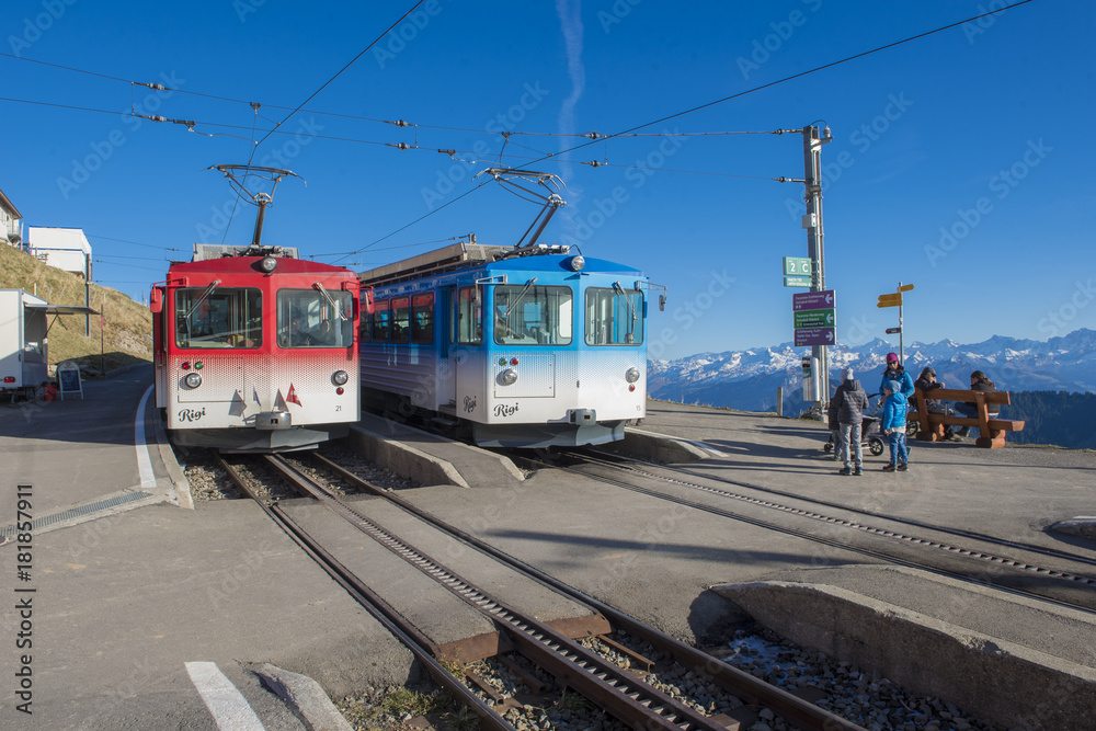 Mt. Rigi, Switzerland - November 1, 2017: a Rigi Railways train leaving the Rigi-Kulm station . Rigi Railways (German: Rigi-Bahnen) is a group of railways on Mount Rigi.Switzerland