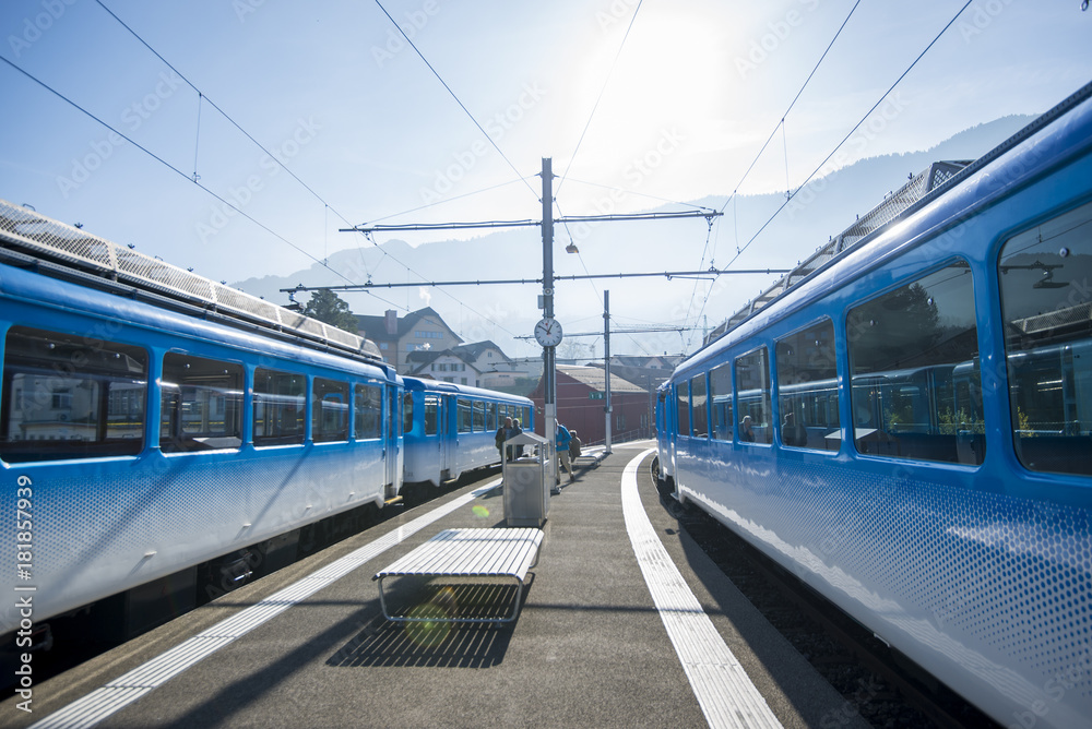 Fototapeta premium Mt. Rigi, Switzerland - November 1, 2017: a Rigi Railways train leaving the Rigi-Kulm station . Rigi Railways (German: Rigi-Bahnen) is a group of railways on Mount Rigi.Switzerland