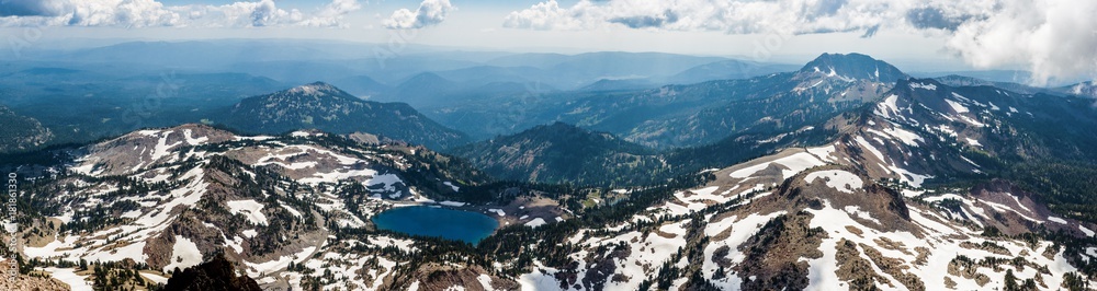 Panoramic view of Lassen Volcanic National Park as seen from Lassen Summit Trail, with snow still on ground in summer