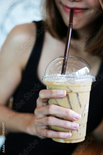 woman drinking cold coffee