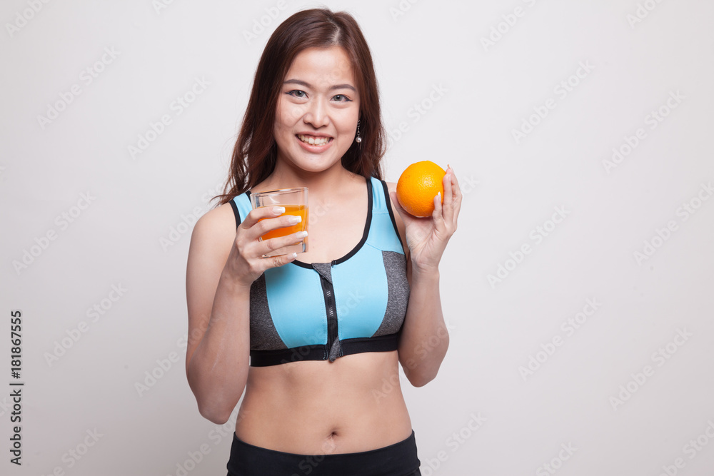 Beautiful Asian healthy girl with orange juice and orange fruit. Beautiful Asian healthy girl with orange juice and orange fruit.
