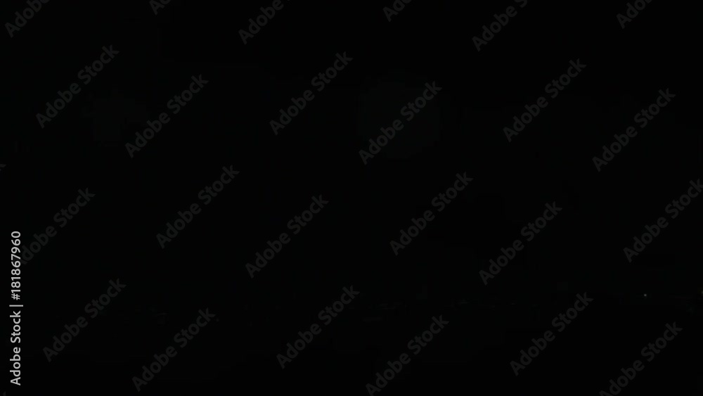 Water splash crown against a black background. Close-up shot Water splash crown against a black background. Close-up shot