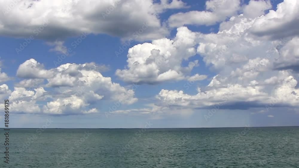 Camera Pan Across Lake Michigan With White Cumulus Clouds Camera Pan Across Lake Michigan With White Cumulus Clouds