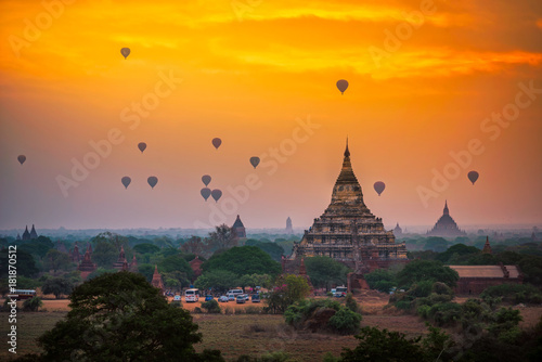 Hot air balloon over plain of Bagan in misty morning, Mandalay, Myanmar © Travel mania