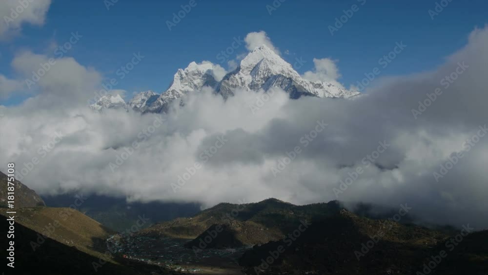 Time lapse. Mount Kangtega and moving clouds. Track to the base camp of Everest in the Himalayas. Sagarmatha National Park, Nepal Time lapse. Mount Kangtega and moving clouds. Track to the base camp of Everest in the Himalayas. Sagarmatha National Park, Nepal