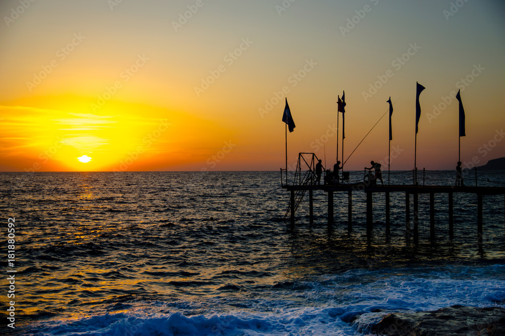 Sea pier at sunset
