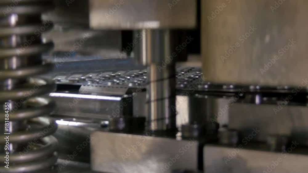 Cutting holes perforation stamping of metal sheets on industrial CNC machine. Automation of work. Refrigeration and ventilation equipment and air conditioners. Modern technologies. Cutting holes perforation stamping of metal sheets on industrial CNC machine. Automation of work. Refrigeration and ventilation equipment and air conditioners. Modern technologies.