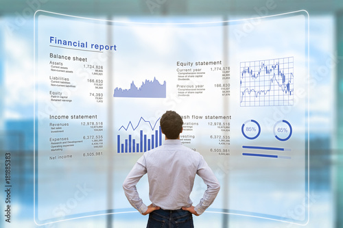 Businessman analyzing financial report data company operations, balance sheet, fintech photo