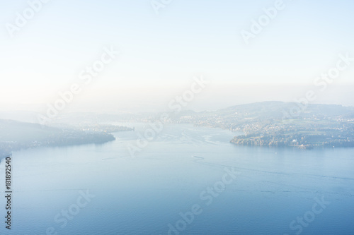view of lake lucerne from buergenstock with fog sky