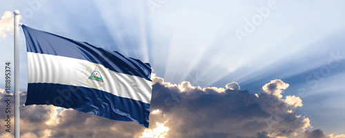 Nicaragua flag on blue sky. 3d illustration photo