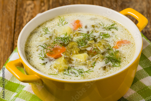 Traditional cucumber soup with pickled cucumbers.