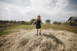 Little girl having fun in a farm