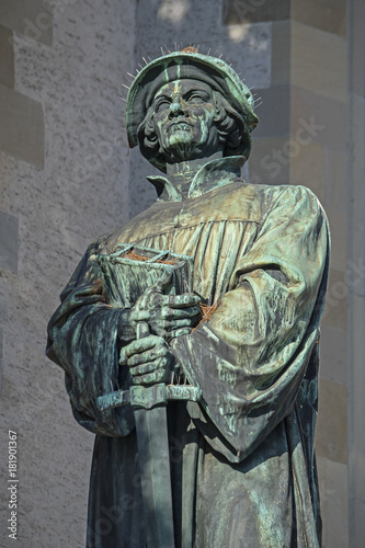 Denkmal für den Reformator Ulrich Zwingli, bei der Wasserkirche in Zürich, Schweiz photo