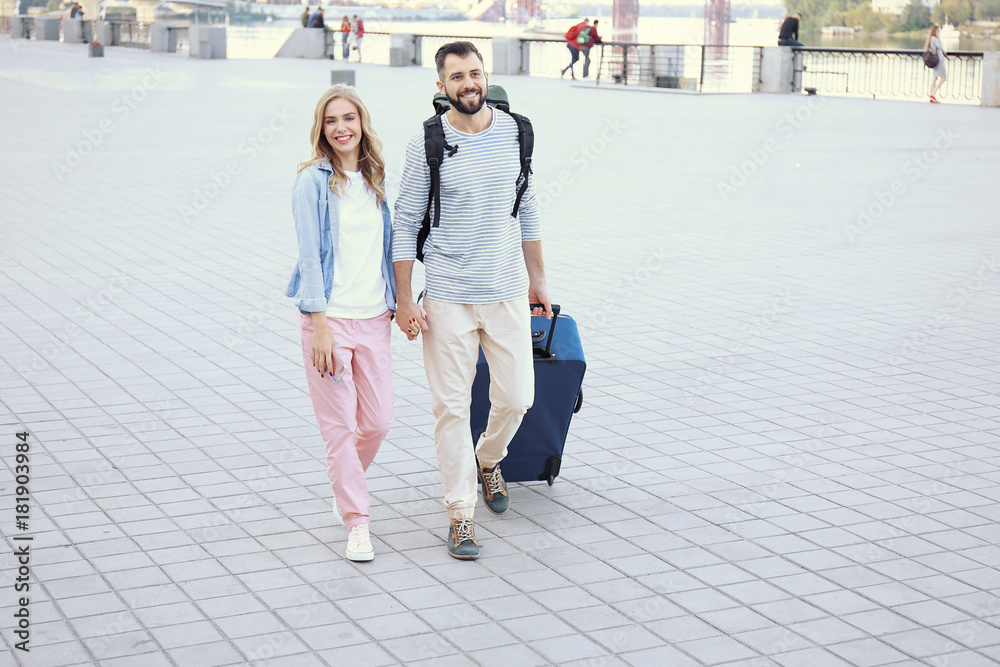 Fototapeta premium Couple of young tourists outdoors