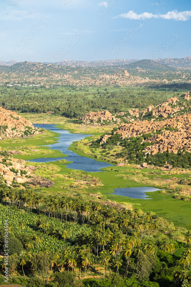 Obraz premium Looking Down on Lush River Valley in Hampi, India