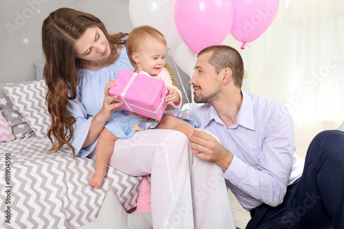 Young family and cute baby ...