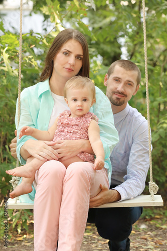 Young family and cute baby ...