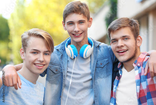 Teenager boys taking selfie...