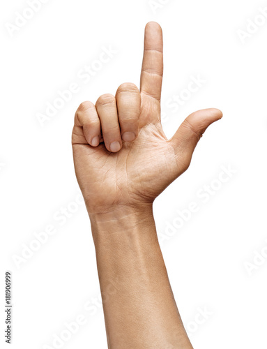 Man's hand showing two fingers isolated on white background. Sign - number two. Close up. High resolution product