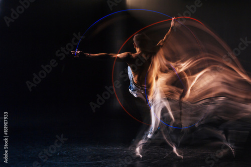 Fototapeta Naklejka Na Ścianę i Meble -  bsolutely serious. Nice pleasant handsome man practicing his movements and being focused on the dance while performing on stage