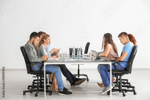 Group of people at table wa...