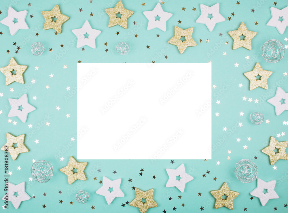 Christmas decorations on mint background.