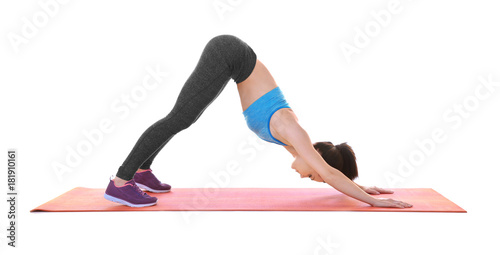 Young sporty woman doing ex...