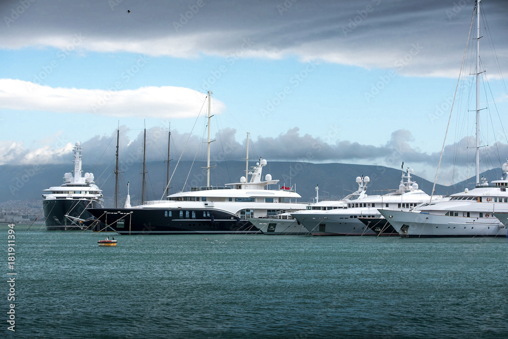 Luxury motorboats and yachts at the dock.Marina Zeas, Piraeus,Greece Luxury motorboats and yachts at the dock.Marina Zeas, Piraeus,Greece